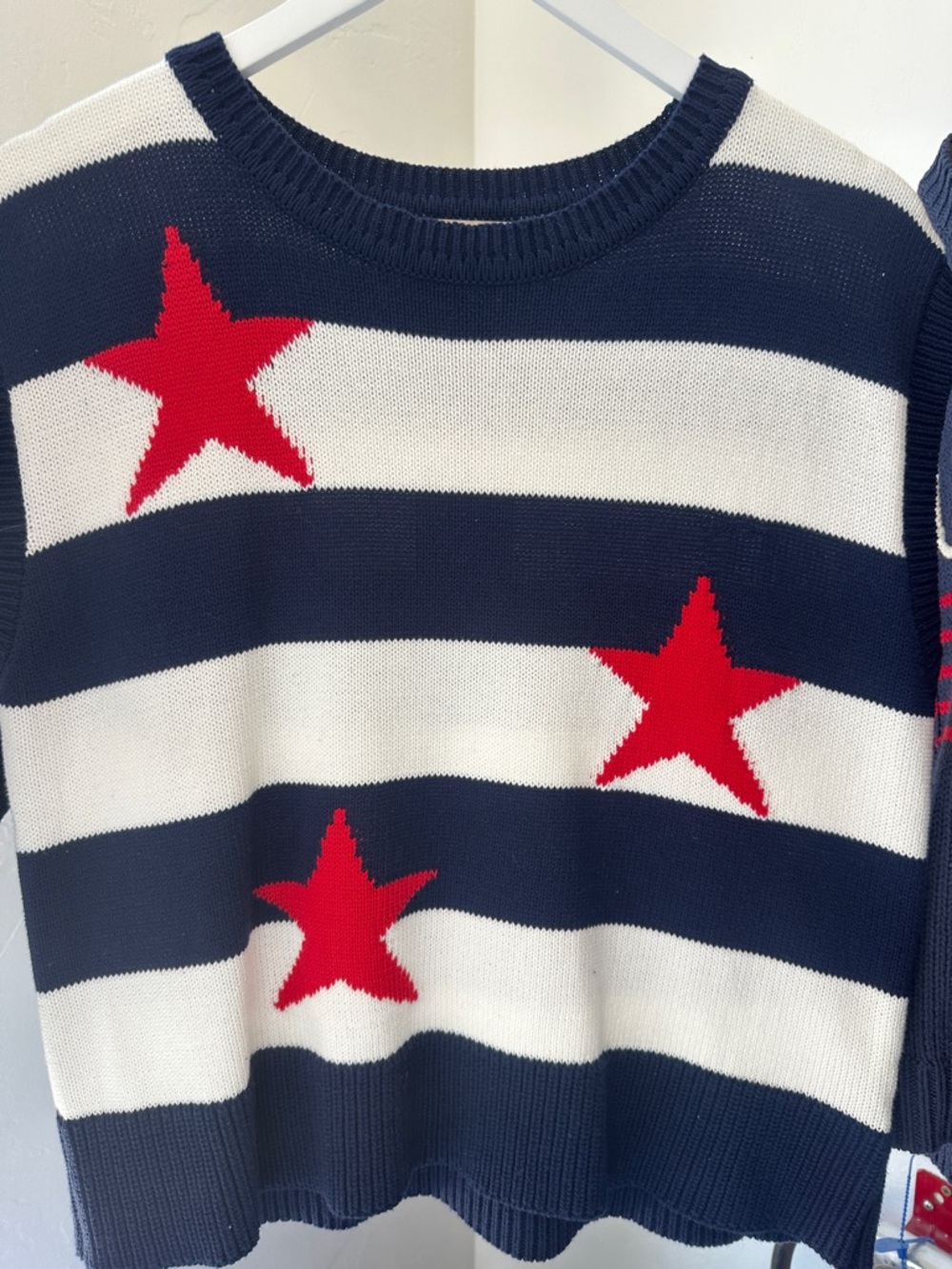 New with tags. Stars and Stripes sleeveless top. Skies are Blue